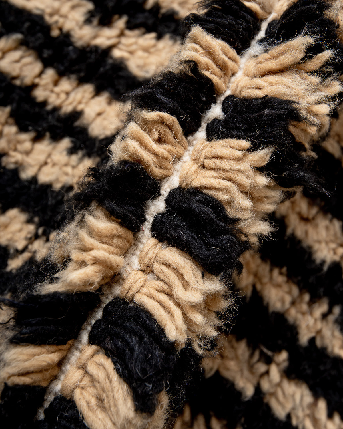 Modern, designer, handcrafted Berber rug from Morocco. Beniourain carpet with beautiful colours and patterns and fluffy wool texture.